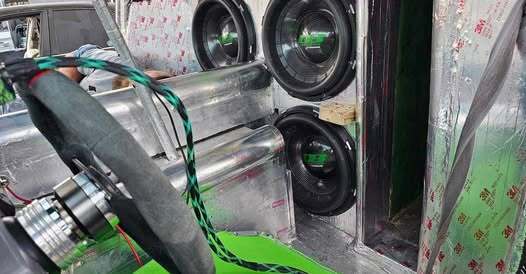 flatwall of subwoofers showing